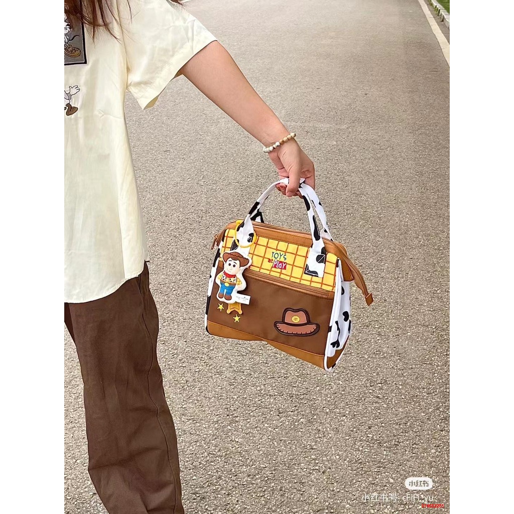 Trong khoﺴMàu sắc tương phản phim hoạt hình xách tay Messenger túi đeo vai sức chứa lớn cho sinh viên mới