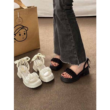 Dép bánh mì 2023 mẫu mới nơ ngọc trai lưới đế dày tăng gót thô nữ