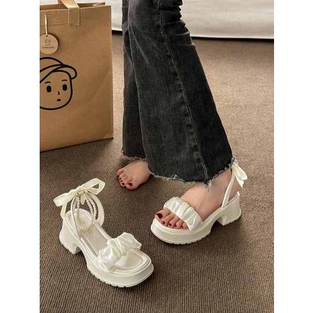 Dép bánh mì 2023 mẫu mới nơ ngọc trai lưới đế dày tăng gót thô nữ