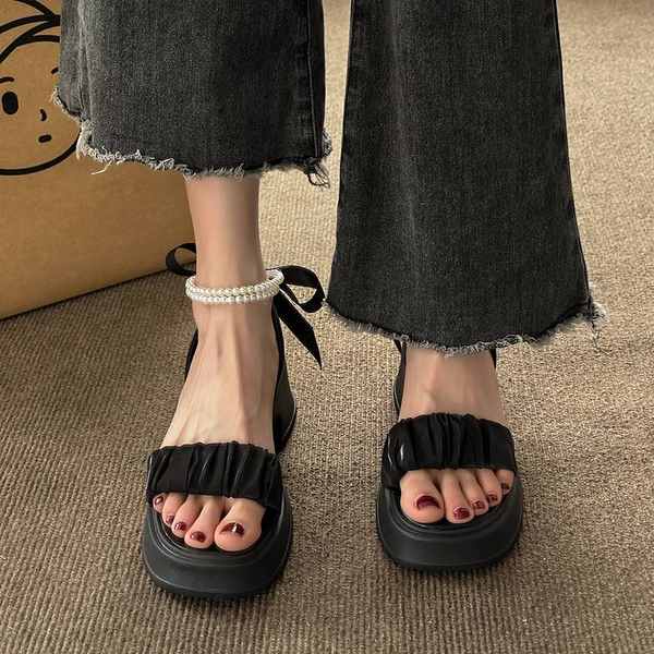 Dép bánh mì 2023 mẫu mới nơ ngọc trai lưới đế dày tăng gót thô nữ