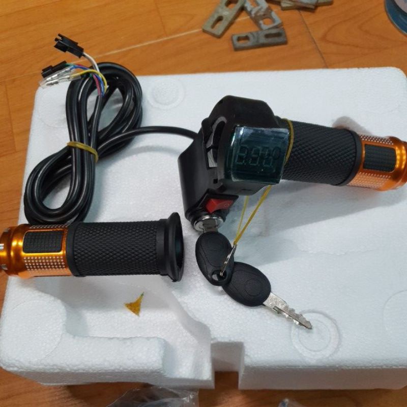 Tay ga đồng hồ báo vol 12-100v xe điện