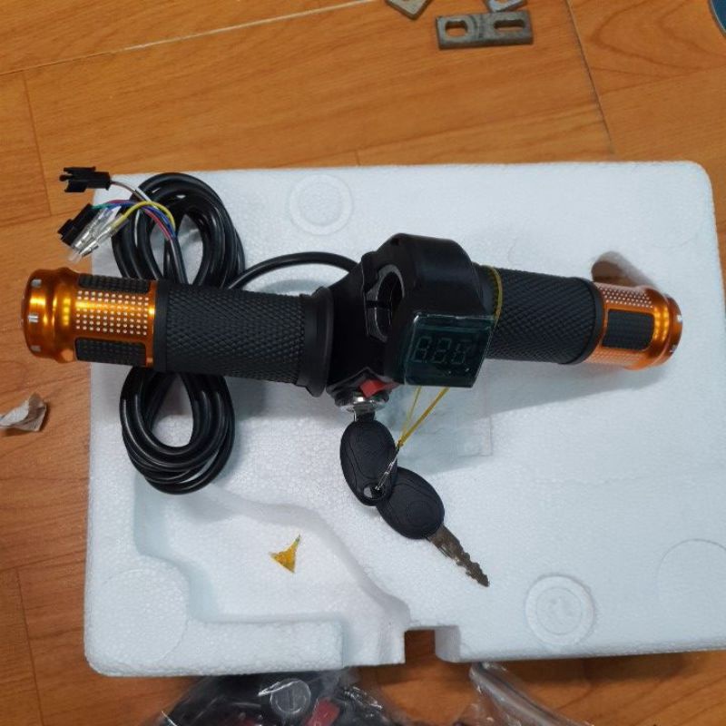 Tay ga đồng hồ báo vol 12-100v xe điện