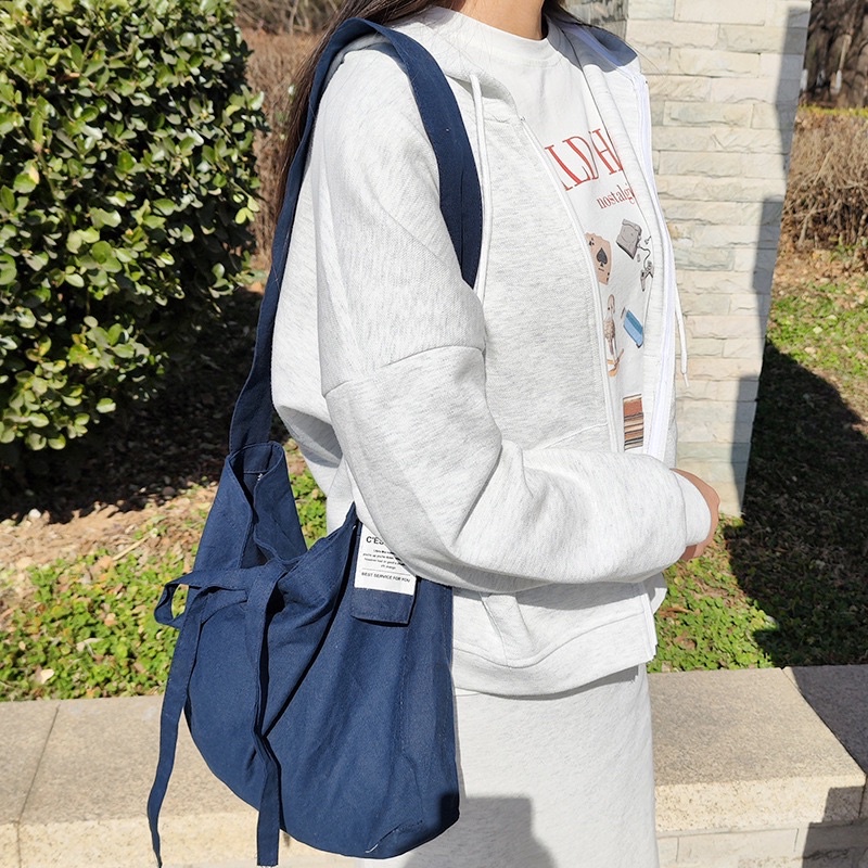 Túi vải đeo chéo dây rút cột nơ Cara Tote đơn giản Hàn quốc dành cho nữ đeo đi học đi chơi