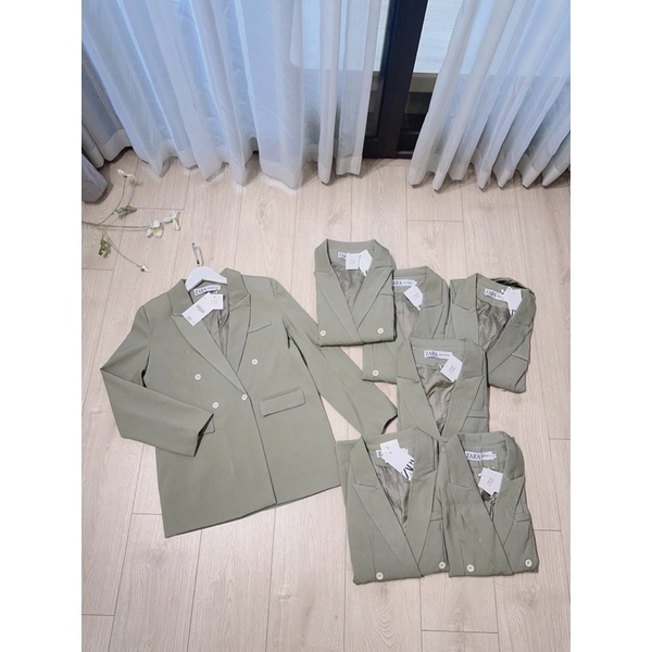 Áo vest xanh rêu 2 hàng cúc