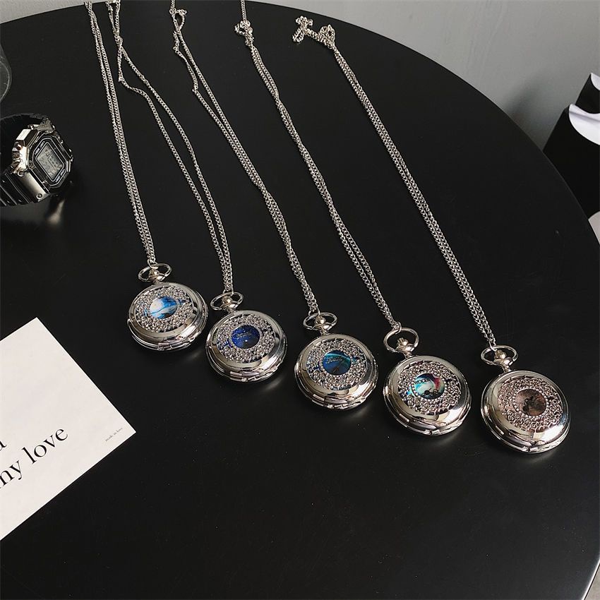 Dây chuyền đồng hồ thời trang cá tính nam và nữ sinh viên cặp đôi mô hình đầy sao rỗng retro lật túi đồng hồ sáng tạo gif