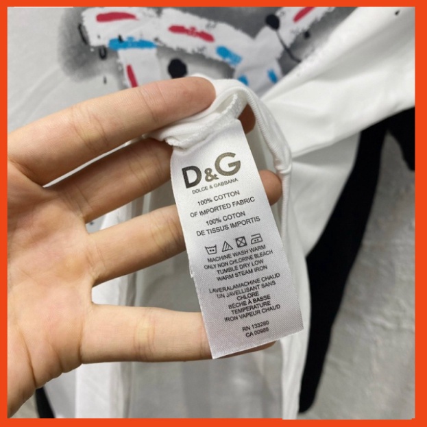 Áo phông nam nữ Dolce in chữ DG vảy sơn loang màu phối tay raglan đen trắng. Áo thun nam nữ unisex form rộng siêu hot | BigBuy360 - bigbuy360.vn