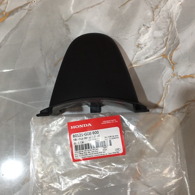 Nắp chụp đèn soi biển số Lead 110 đời cũ   chính hãng Honda