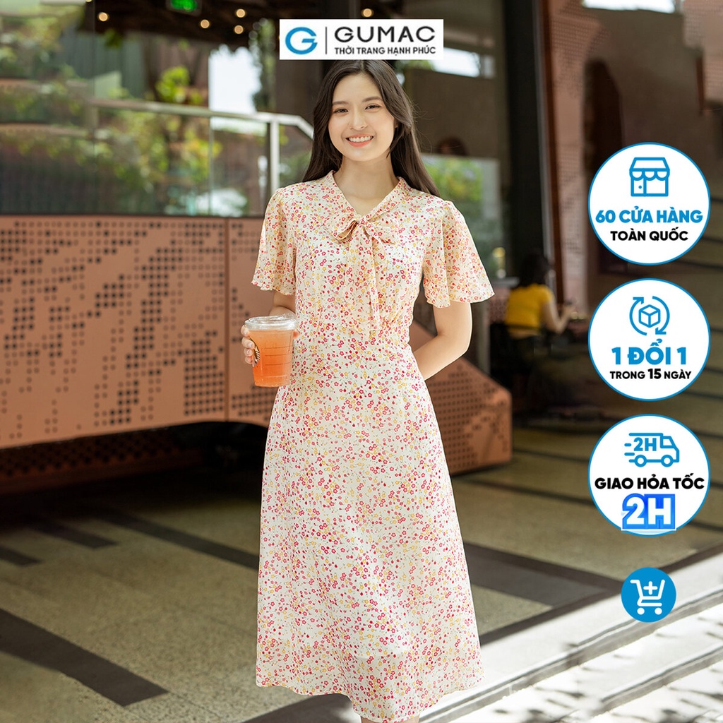 Đầm họa tiết phối nơ thời trang GUMAC DD07064