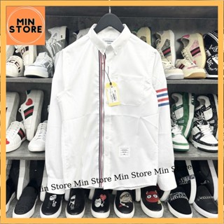 Áo Sơ Mi Trắng Nam Nữ Dài Tay Thom Browne Tay In 4 Sọc Xanh Đỏ Phối Vạch Khoá Bạc Dọc Khuy Vải HafngHafng Cao Cấp 2023