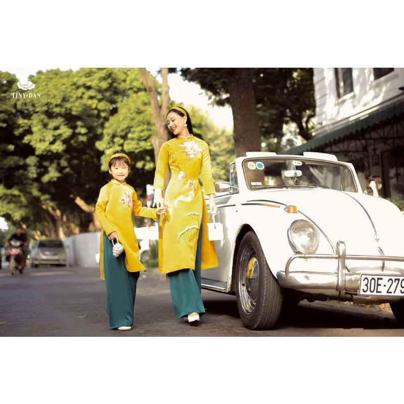 Áo dài Gia đình tafta Song Ngư màu vàng xanh phù hợp mặc tết 2024