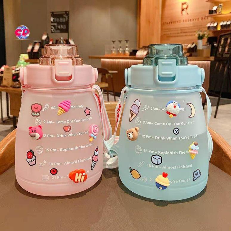 Bình nước màu hồng cao cấp1200ml tặng kèm dây  . ocp