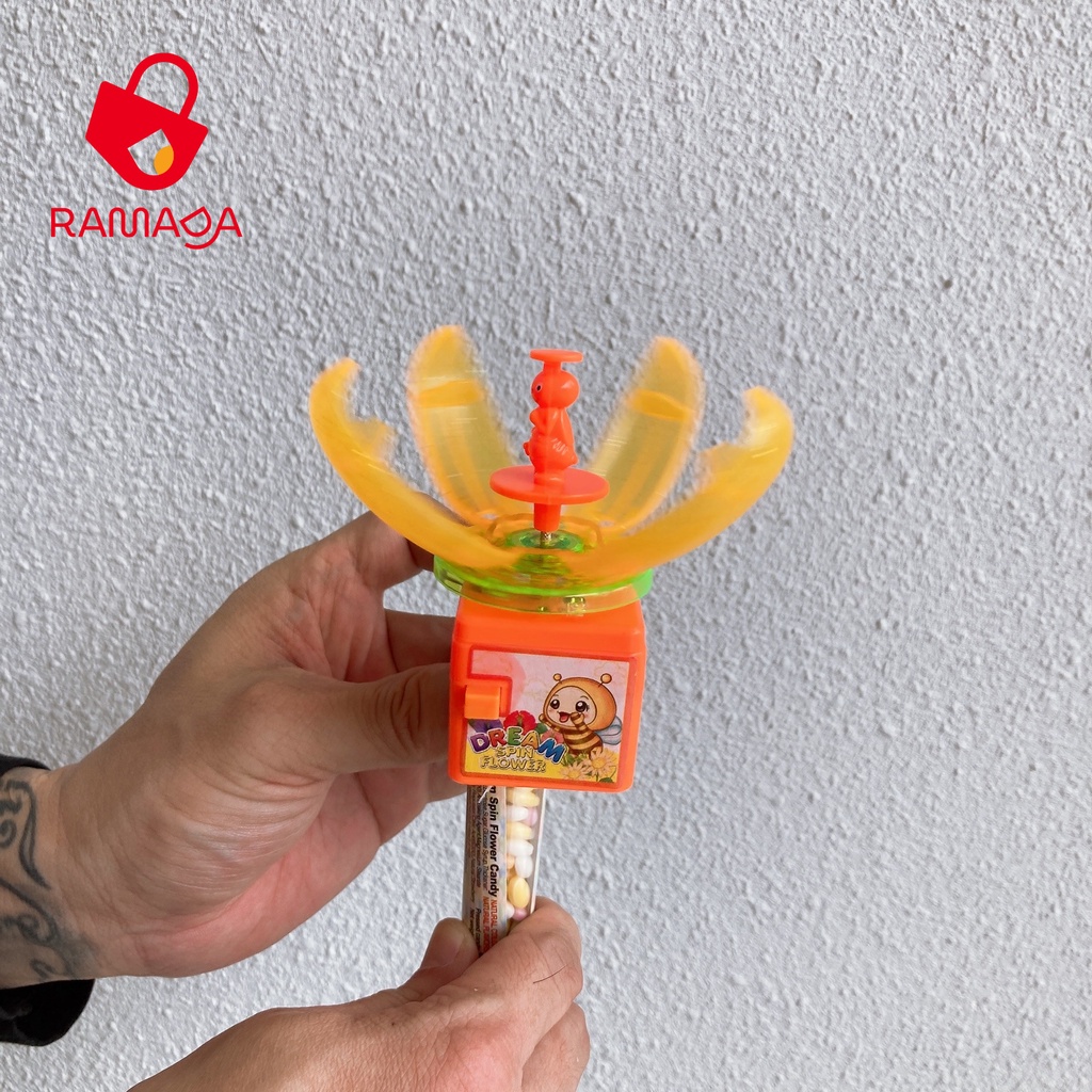 Ramada - Đồ chơi hoa xoay có đèn và kẹo Juqi dành cho bé