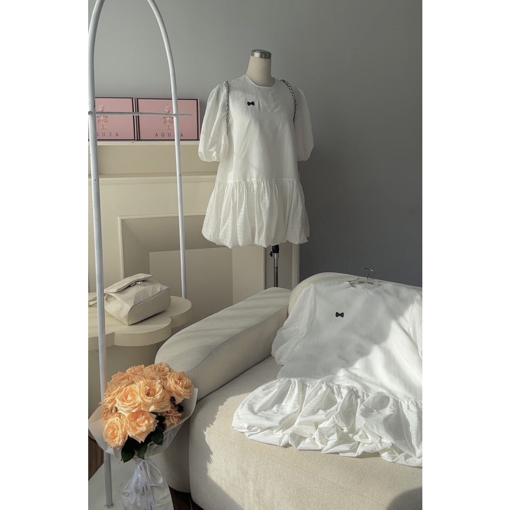Jeny dress váy bèo nhún tay bo chun in nơ dập nổi AGUJA