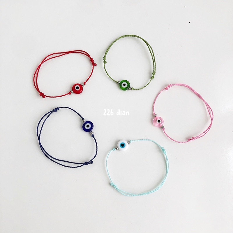 Vòng tay nam, nữ mắt quỷ waterproof