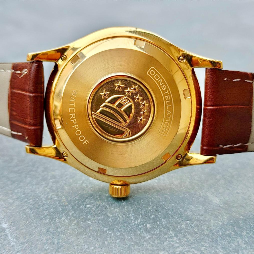 Đồng hồ Nam Omg bát quái mặt vàng  vỏ vàng ta mặt trắng dòng cơ Automatic size 40mm dây da