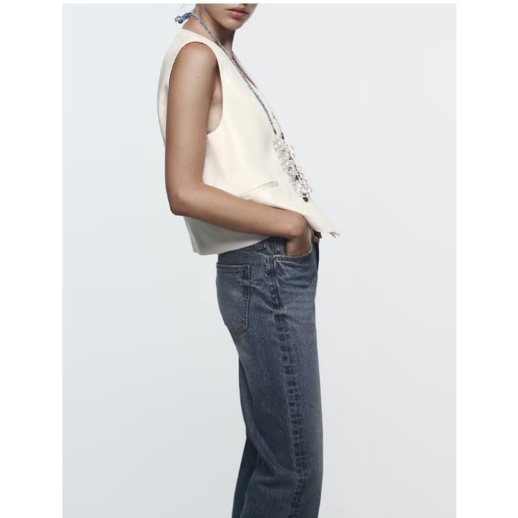 Morocco Zara Áo gile màu kem khuy đen - Luumooc