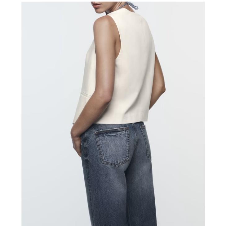 Morocco Zara Áo gile màu kem khuy đen - Luumooc