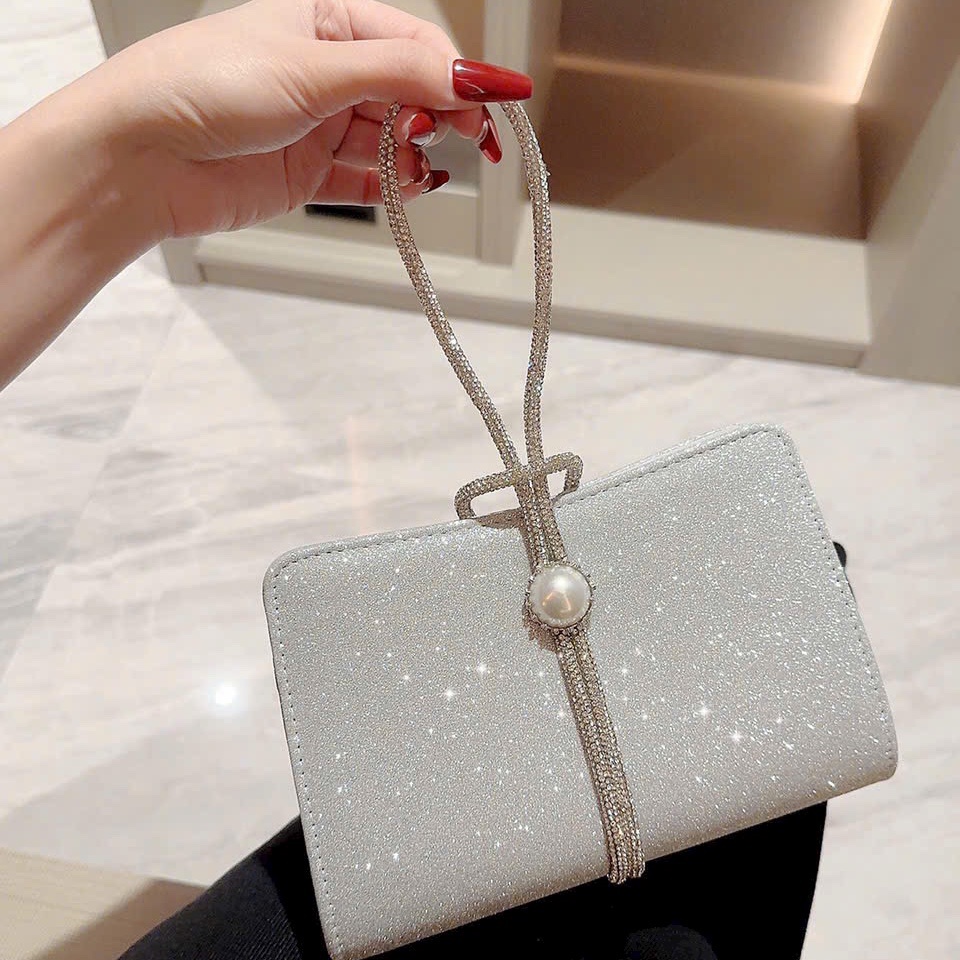 Clutch cầm tay quai cầm tay bling bling