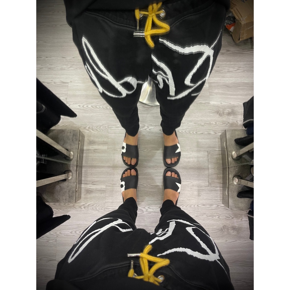 Quần Jogger Dài Nam Nỉ Da Cá Đen Trơn In Chữ Rhude Trắng Cạp Chun Dây Thắt Vàng . Quần Dài Nam Cho Các Boy Phố Đi Chơi