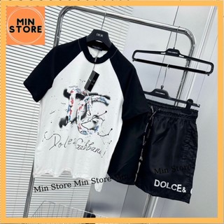 Bộ Đồ Nam Cộc Tay Mặc Hè Dolce In Chữ Logo DG Loang Vảy Sơn Màu Phối Tay Raglan Đen Trắng Quần Gió . Bộ Quần Áo Thể Thao
