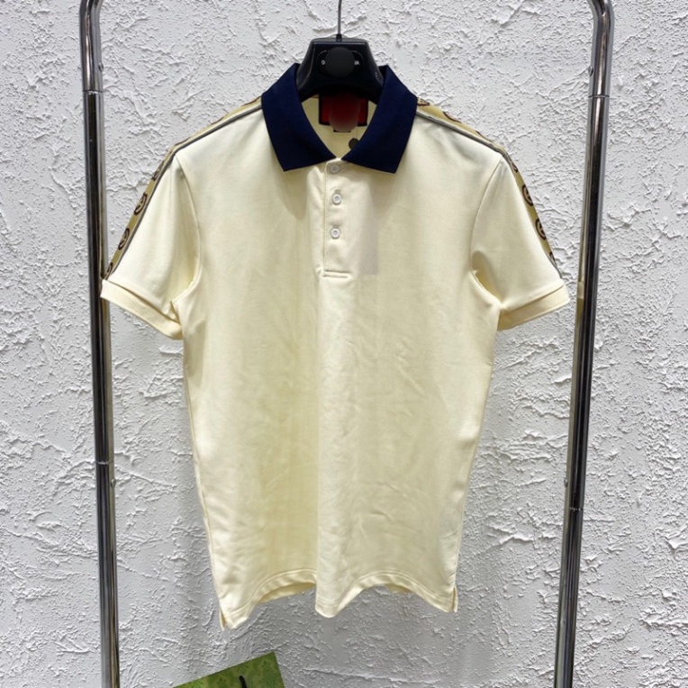 Áo Polo Nam Cổ Bẻ Cotton Gai Thêu Vạch Chữ Monogram Nâu Dọc Viền Tay Đơn Giản Cho Các Boy Phố Hottrend 2023