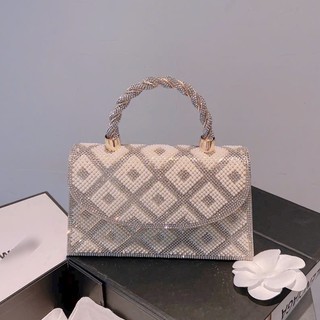 Ví cầm tay nữ nạm đá quai xoắn bling bling