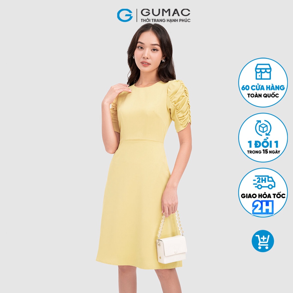 Đầm nữ thời trang GUMAC màu vàng dáng chữ A phối tay nhún DC07050