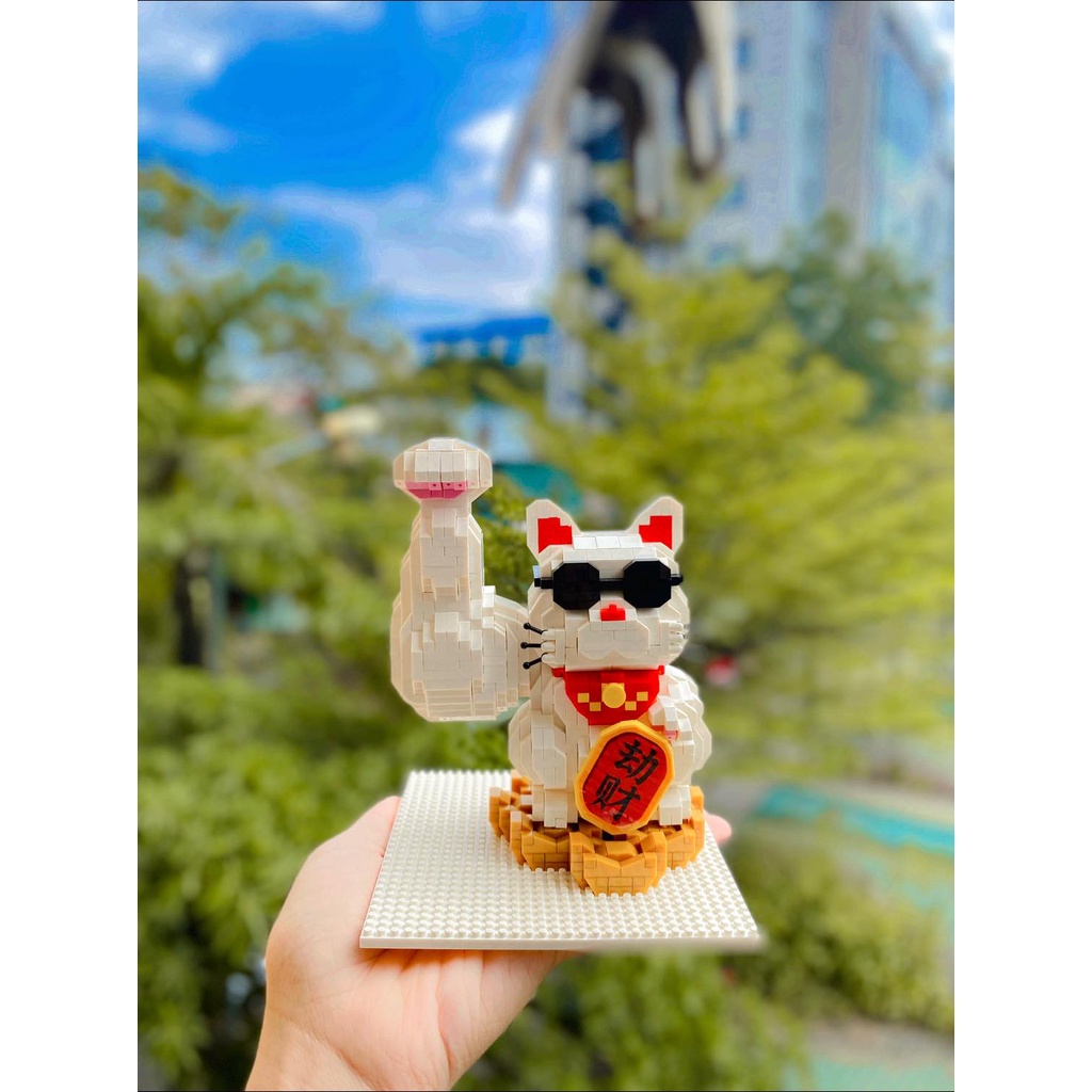 Mèo thần tài cơ bắp lực sĩ tay to tay đô cầu tài