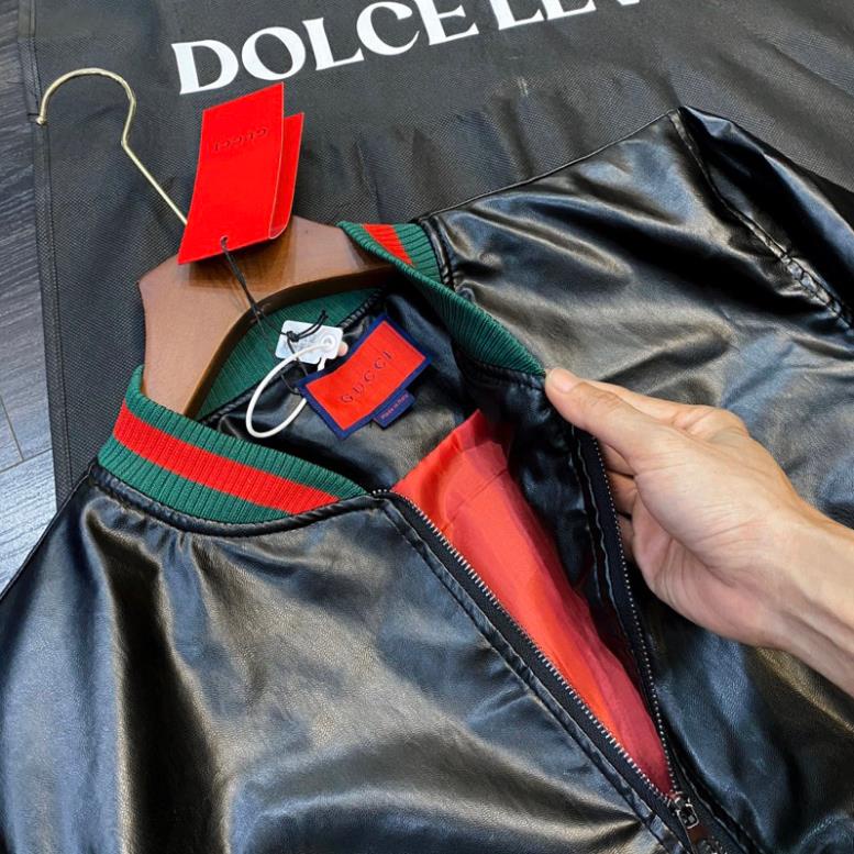 Áo Khoác Bomber Da Nam Nữ GC Da Đen Bóng Trơn Phối Bo Chun Sọc Xanh Đỏ Lót Gió 2 Lớp Dày Dặn Hàng Siêu Cấp Cho Boy