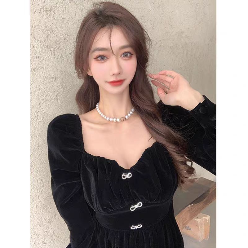 Đầm nhung tay phồng kết nơ đá xinh xắn