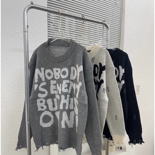 Áo len rách gấu chữ no body oversize