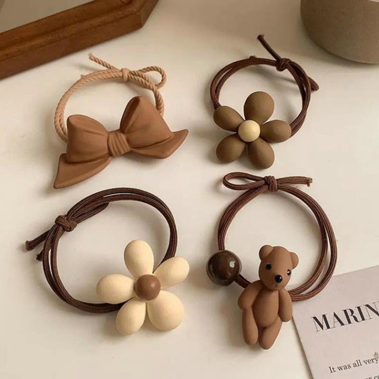 Dây cột tóc nữ co giãn tông màu nâu trắng in họa tiết gấu hoa nơ phong cách tiểu thư dễ thương