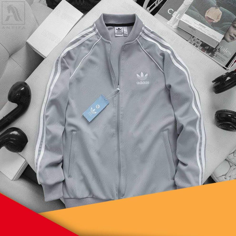 Áo Khoác Adidas Thể Thao Chất Thun Dày Dặn Chống Gió - Áo Bomber Nam Nữ 3 Sọc Hình Thêu Cao Cấp