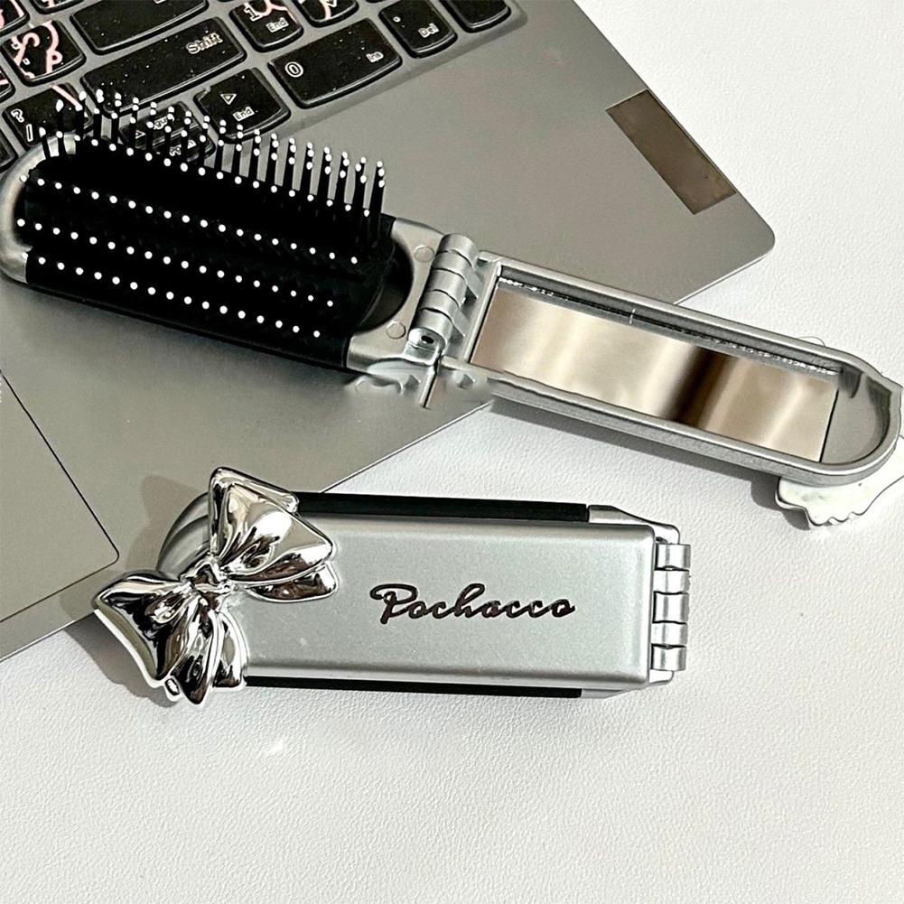 SOUG Phim hoạt hình mới san liou túi khí gấp di động lược kitty cat gương trang điểm cầm tay mục đích kép lược gương tích hợp