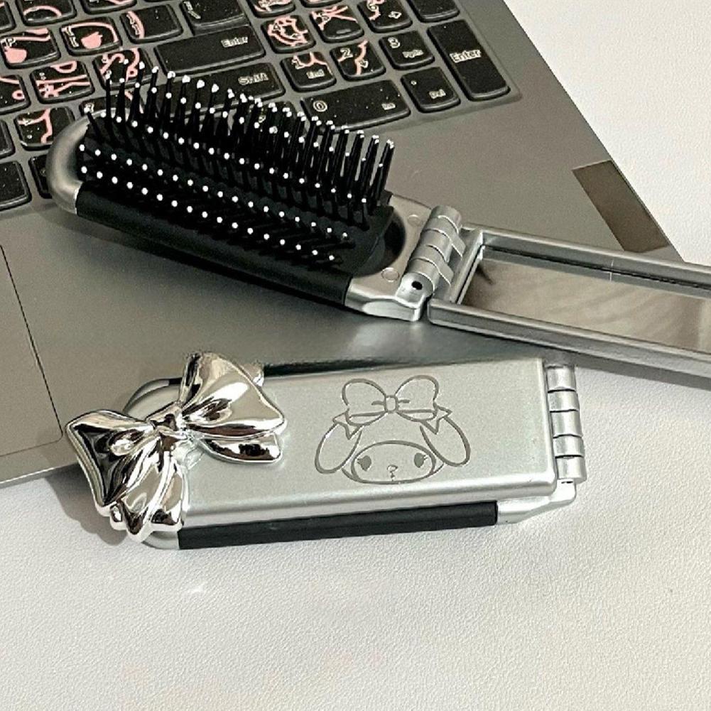 SOUG Phim hoạt hình mới san liou túi khí gấp di động lược kitty cat gương trang điểm cầm tay mục đích kép lược gương tích hợp