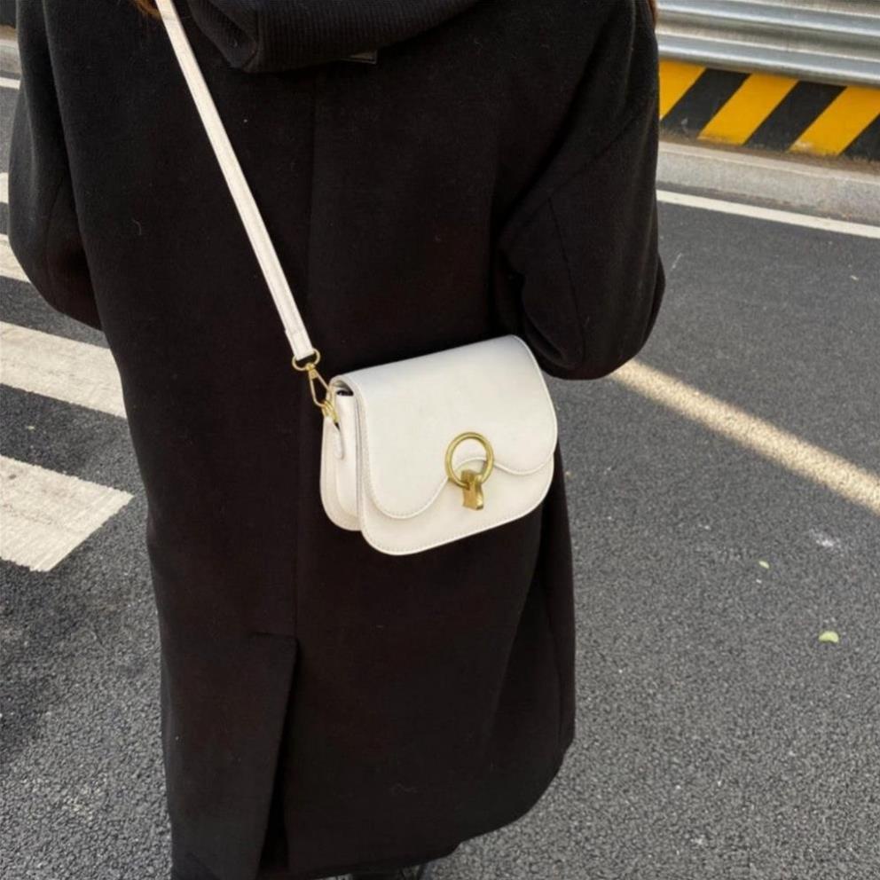 Túi xách nữ đẹp đi chơi đi học thời trang hoạ tiết khoá chữ O tròn TX64