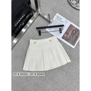 Chân váy dạ khuy xếp ly hàng QC