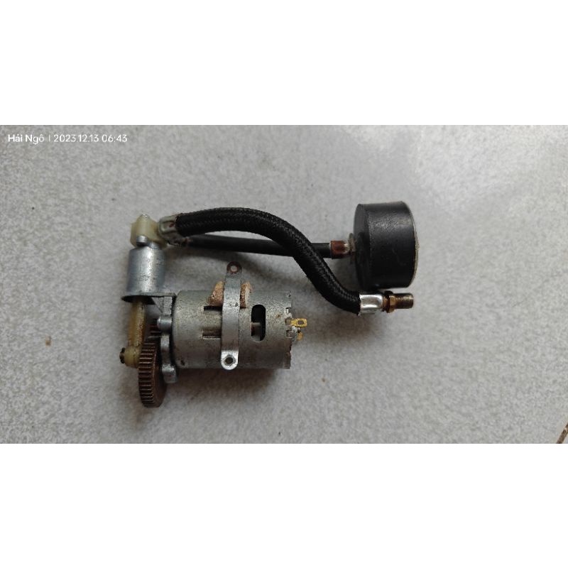 Máy nén khí mini 12v bơm xe máy Nhật bãi