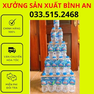 Tháp mica trưng bày chai nước để chùa, tháp nước lễ tết