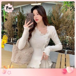 Áo kiểu đính nơ đá thun gân lạnh