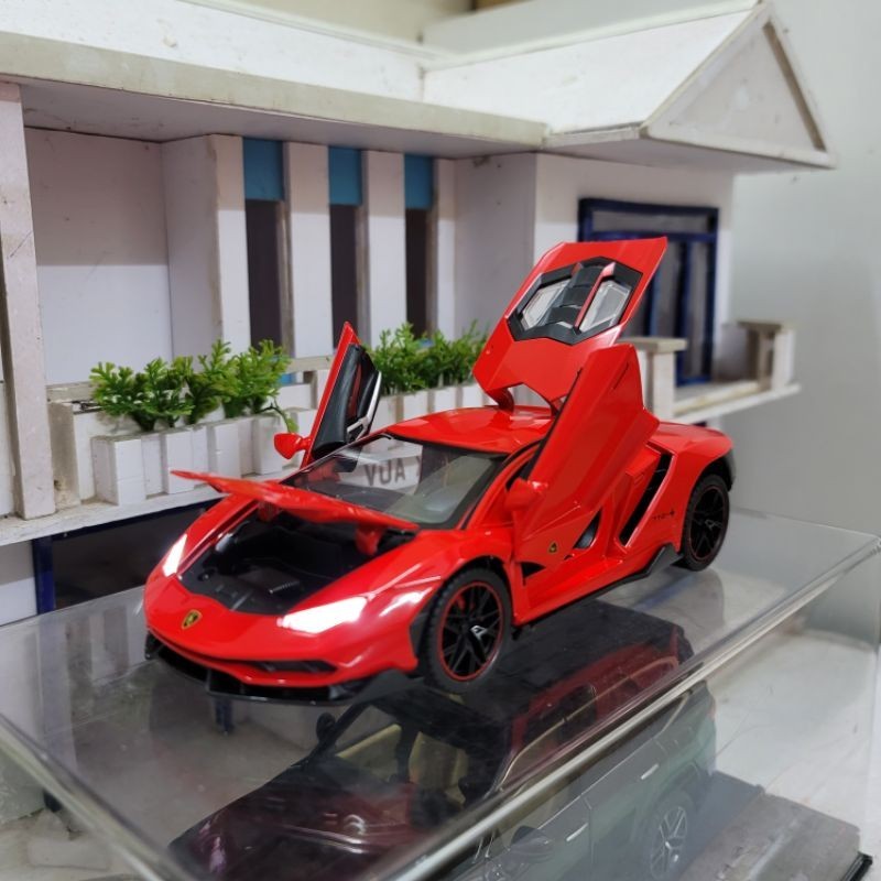 Mô hình xe Lamborghini Centenario tỉ lệ 1:24 có còi, có đánh lái và chạy cót