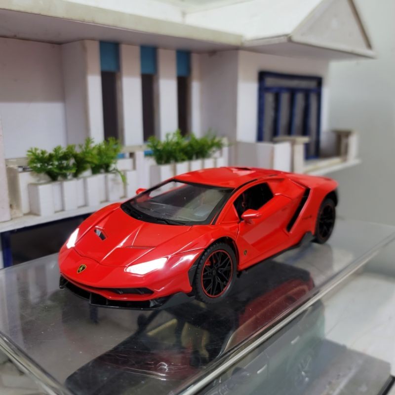 Mô hình xe Lamborghini Centenario tỉ lệ 1:24 có còi, có đánh lái và chạy cót