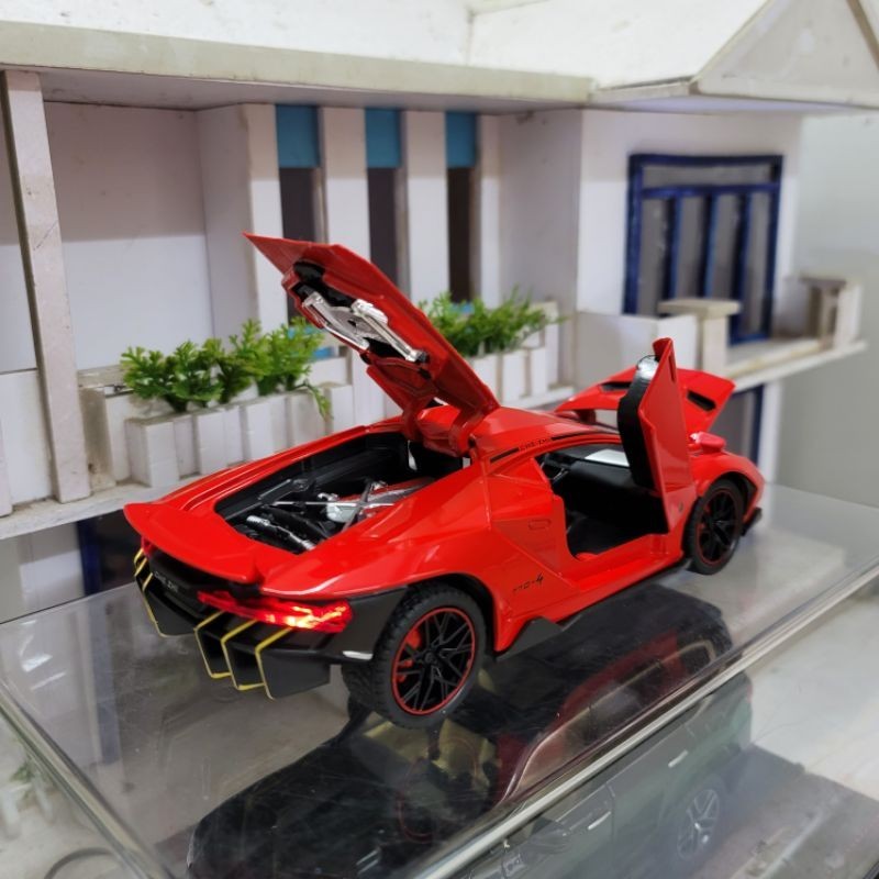Mô hình xe Lamborghini Centenario tỉ lệ 1:24 có còi, có đánh lái và chạy cót