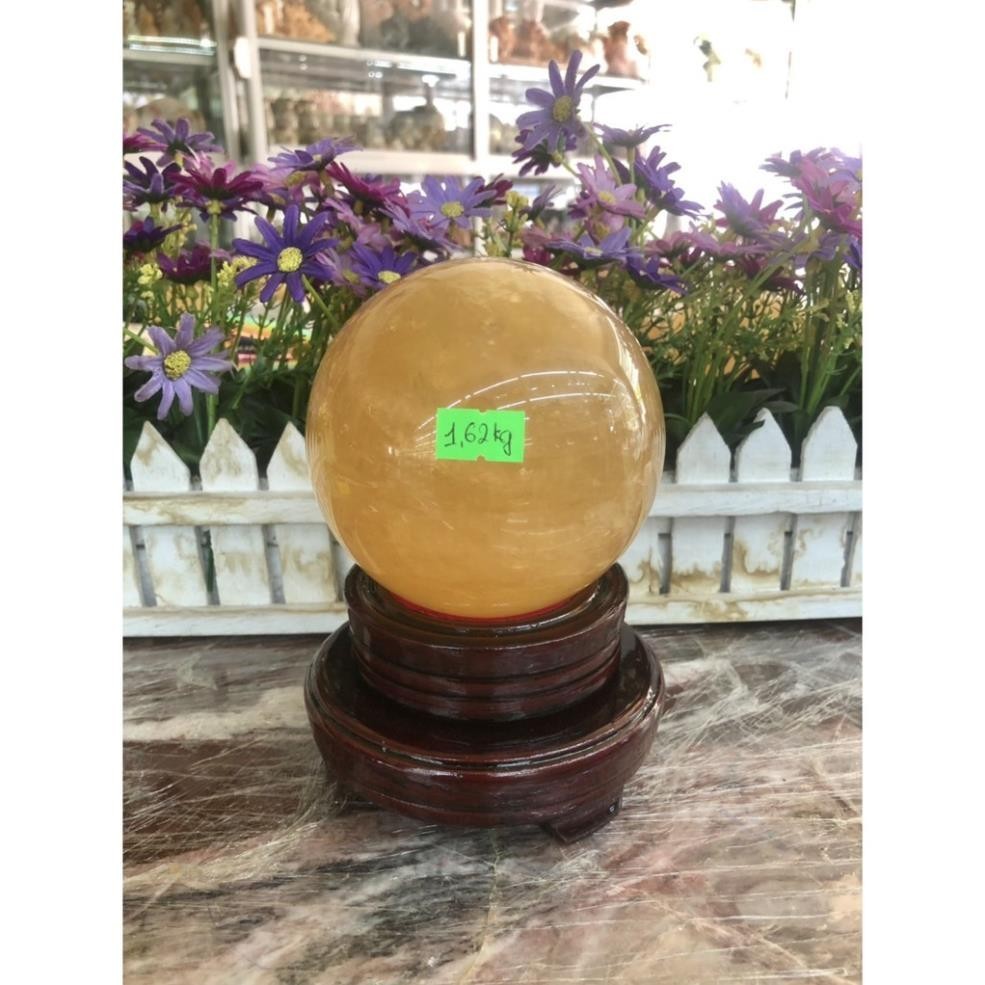 Quả cầu phong thủy đá TA. vàng