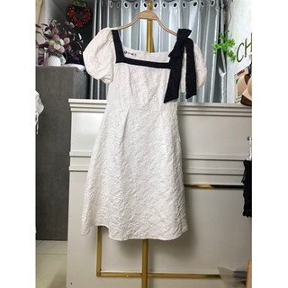 Váy gấm nơ đen