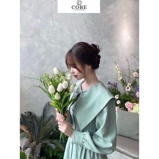 Váy đầm nữ cổ nơ tay bồng đầm váy nữ thiết kế tiểu thư cổ nơ tay bồng tôn dáng vải tuyết mưa hàn cao cấp cobe.official