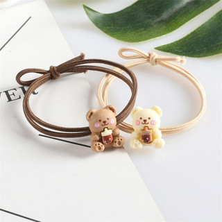Thun buộc tóc gấu ôm bình sữa