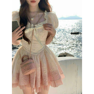 Đầm gấm mini xòe cổ bèo cột nơ siêu dễ thương