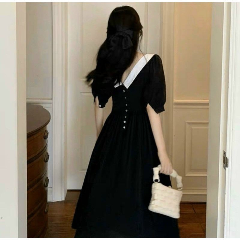 Đầm đen cổ sen nút vintage