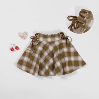 Chân váy xòe caro đan dây bé gái nexxi